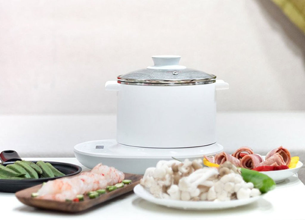 Электрическая плита Xiaomi Qcooker Multipurpose Electric Cooker – универсальная и компактная электрическая плита с комплектом из кастрюли, пароварки и сковороды.